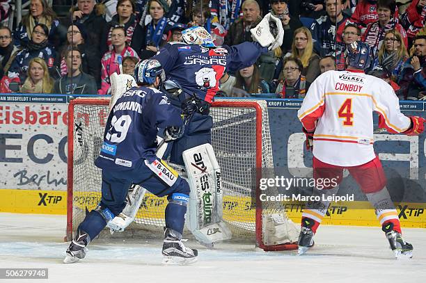 Petri Vehanen of the Eisbaeren Berlin jumps to save goal the puck during the DEL game between the Eisbaeren Berlin and Duesseldorfer EG on January...