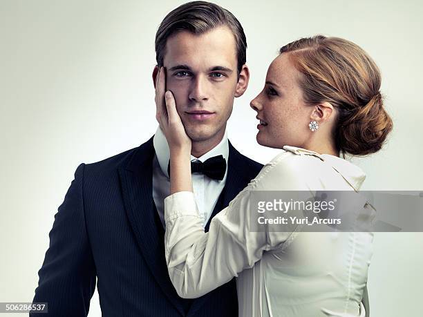 he makes them weak at the knees - dinner jacket stock pictures, royalty-free photos & images