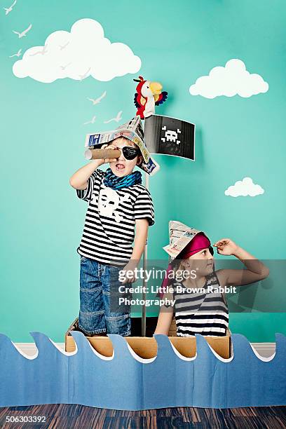 angel girl with wings amongst a messy room - windjammer stock-fotos und bilder