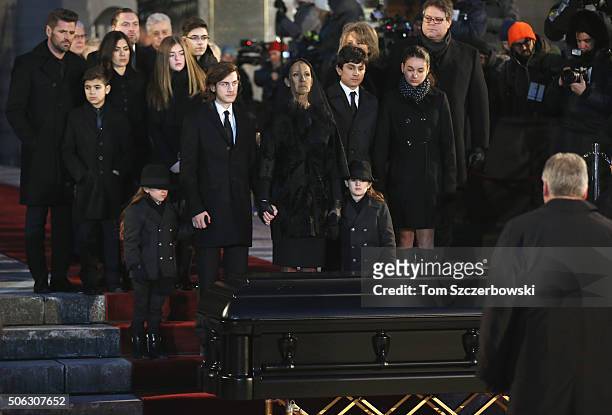 Recording artist Celine Dion and children Rene-Charles Angelil, Eddy Angelil and Nelson Angelil attend the State Funeral Service for Celine Dion's...