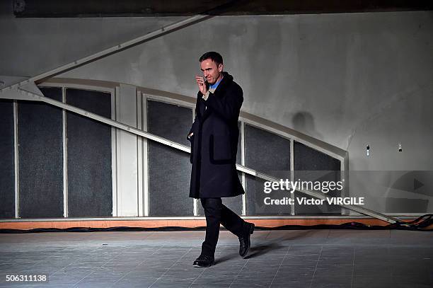 Fashion designer Raf Simons walks the runway during the Raf Simons Menswear Fall/Winter 2016-2017 show as part of Paris Fashion Week on January 20,...