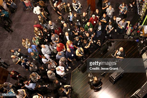 Convention goers experience the exhibits during day 2 of the 2016 NAMM Show at the Anaheim Convention Center on January 22, 2016 in Anaheim,...
