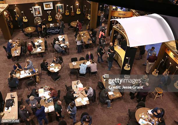 Convention goers experience the exhibits during day 2 of the 2016 NAMM Show at the Anaheim Convention Center on January 22, 2016 in Anaheim,...