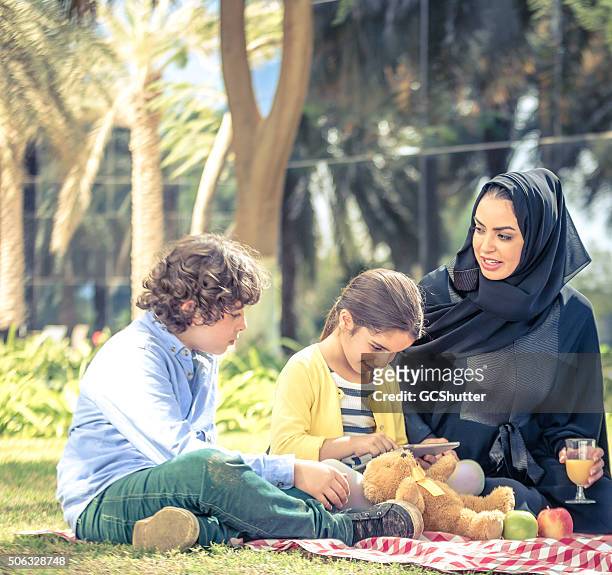 modern arab family - hot arabic girl stock pictures, royalty-free photos & images