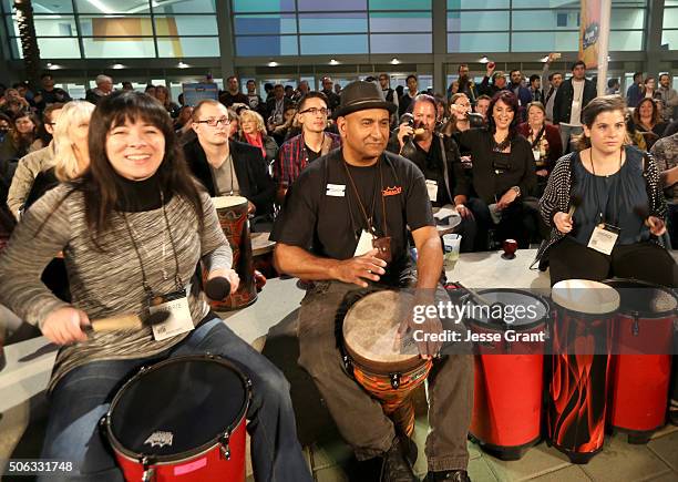 Convention goers participate in the drum circle during day 2 of the 2016 NAMM Show at the Anaheim Convention Center on January 22, 2016 in Anaheim,...