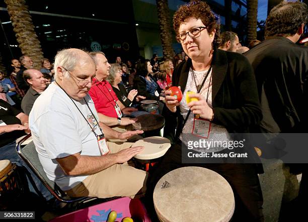 Convention goers participate in the drum circle during day 2 of the 2016 NAMM Show at the Anaheim Convention Center on January 22, 2016 in Anaheim,...