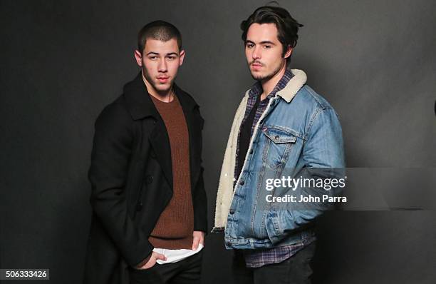 Actors Nick Jonas and Ben Schnetzer from the film 'Goat' pose for a portrait during The Hollywood Reporter 2016 Sundance Studio at Rock & Reilly's...