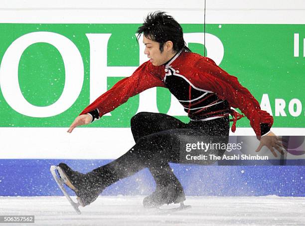 Daisuke Takahashi of Japan falls in the Men's Singles Free Program during day four of the ISU World Figure Skating Championships at Luzhniki Sports...