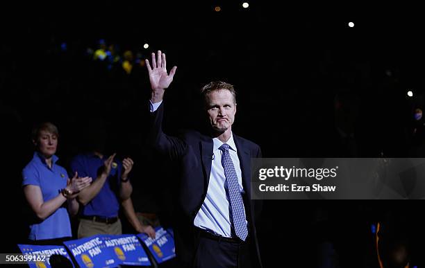 Head coach Steve Kerr of the Golden State Warriors waves to the crowd before their game against the Indiana Pacers at ORACLE Arena on January 22,...