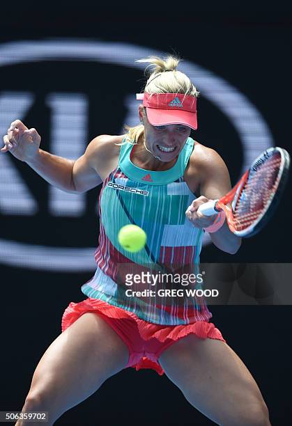 Germany's Angelique Kerber plays a forehand return during her women's singles match against Madison Brengle of the US on day six of the 2016...