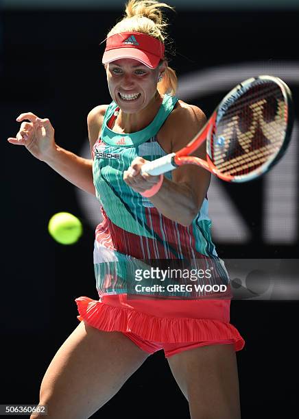 Germany's Angelique Kerber plays a forehand return during her women's singles match against Madison Brengle of the US on day six of the 2016...