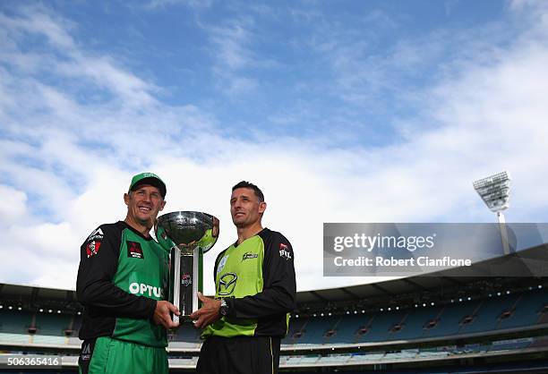 David Hussey of the Melbourne Stars and Mike Hussey of the Sydney Thunder pose during a media opportunity ahead of the 2016 Big Bash League Final at...