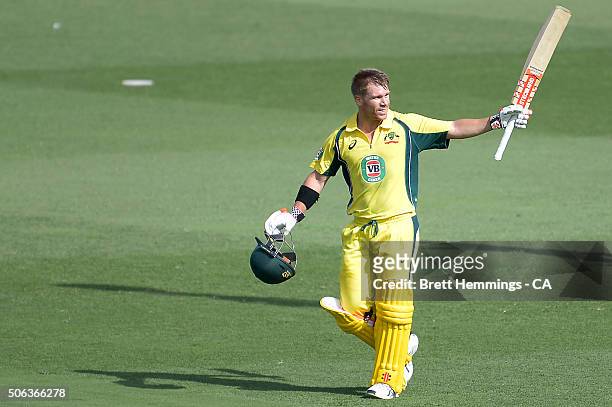 David Warner of Australia celebrates scoring his century during game five of the Commonwealth Bank One Day Series match between Australia and India...