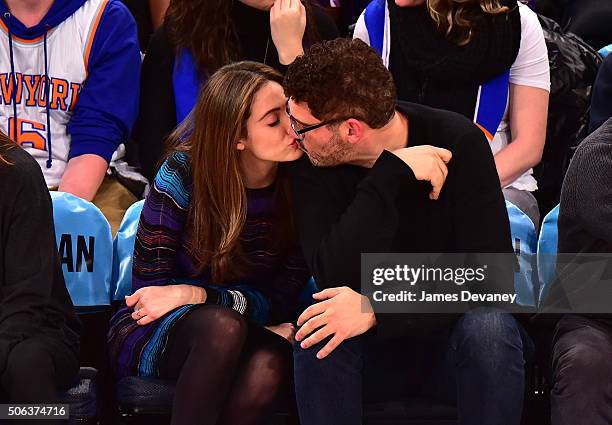 Emmy Rossum and Sam Esmail attend the Los Angeles Clippers vs New York Knicks game at Madison Square Garden on January 22, 2016 in New York City.