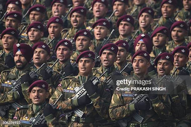 An Indian Army contingent takes part in the full dress rehearsal for the upcoming Indian Republic Day parade on Rajpath in New Delhi on January 23,...