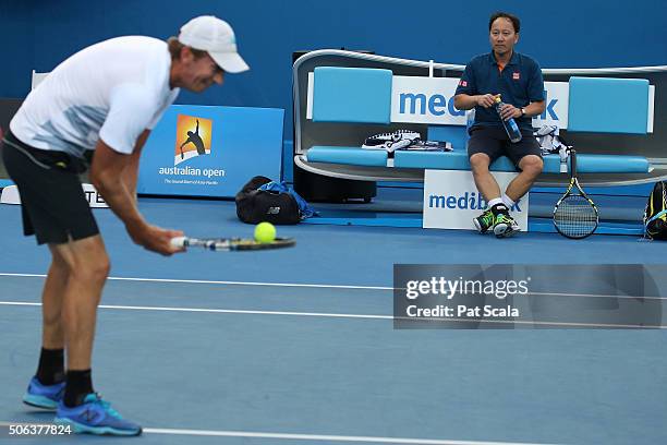 Wayne Arthurs of Australia and Michael Chang of the United States play up for the crowd in their third round match against Jonas Bjorkman of Sweden...