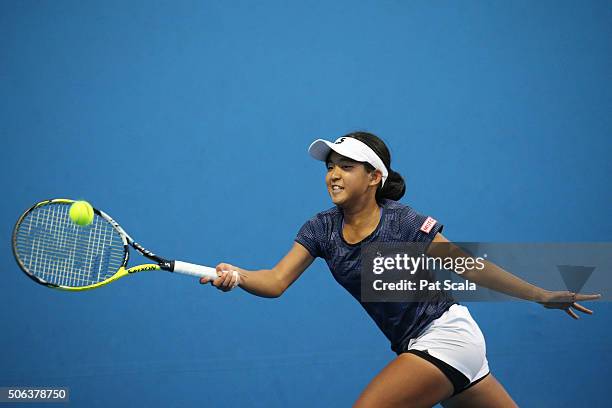 Satoko Sueno of Japan plays a forehand in her first round juniors match against Bianca Andreescu of Canada during the Australian Open 2016 Junior...