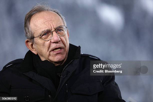 Pier Carlo Padoan, Italy's finance minister, speaks during a Bloomberg Television interview at the World Economic Forum in Davos, Switzerland, on...