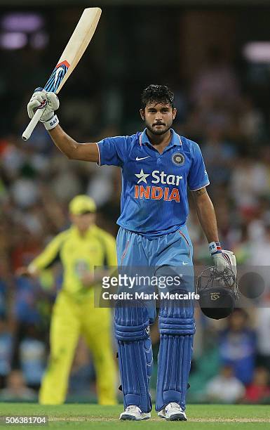 Manish Pandey of India celebrates and acknowledges the crowd after scoring a century during game five of the Commonwealth Bank One Day Series match...