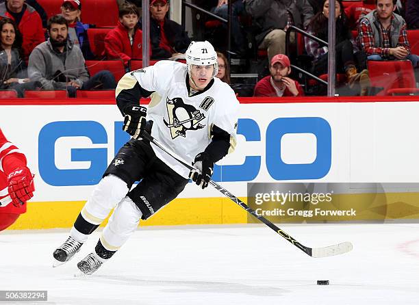 Evgeni Malkin of the Pittsburgh Penguins controls the puck on the ice during an NHL game against the Carolina Hurricanes at PNC Arena on January 12,...