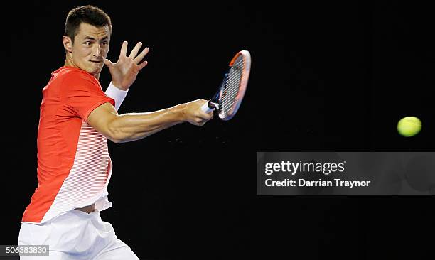 Bernard Tomic of Australia plays a forehand in his third round match against John Millman of Australia during day six of the 2016 Australian Open at...