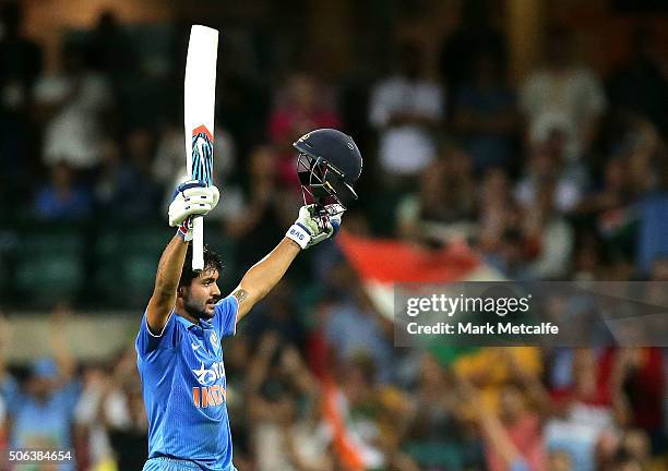 Manish Pandey of India celebrates and acknowledges the crowd after scoring a century during game five of the Commonwealth Bank One Day Series match...