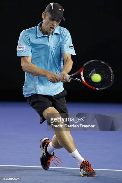 John Millman of Australia plays a backhand in his third round match against Bernard Tomic of Australia during day six of the 2016 Australian Open at...