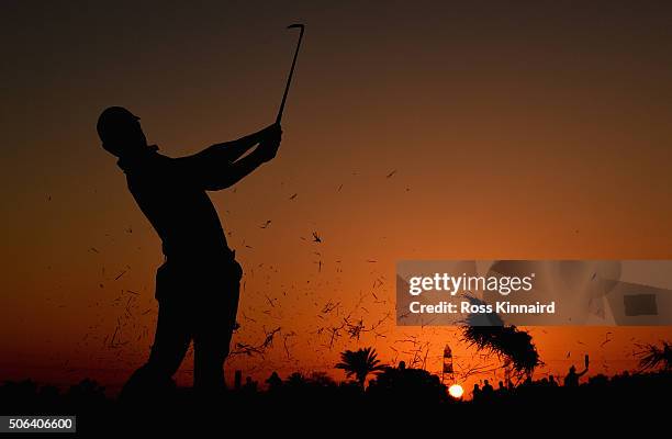 Rory McIlroy of Northern Ireland plays his second shot on the par four 9th hole during the third round of the Abu Dhabi HSBC Golf Championship at the...