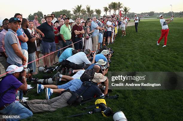 Rory McIlroy of Northern Ireland plays his second shot on the ninth hole during the third round of the Abu Dhabi HSBC Golf Championship at the Abu...