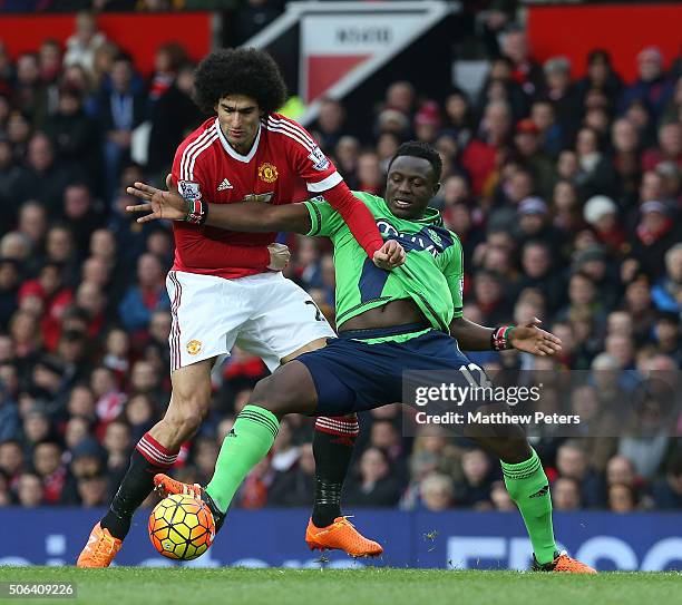 Marouane Fellaini of Manchester United in action with Victor Wanyama of Southampton during the Barclays Premier League match between Manchester...