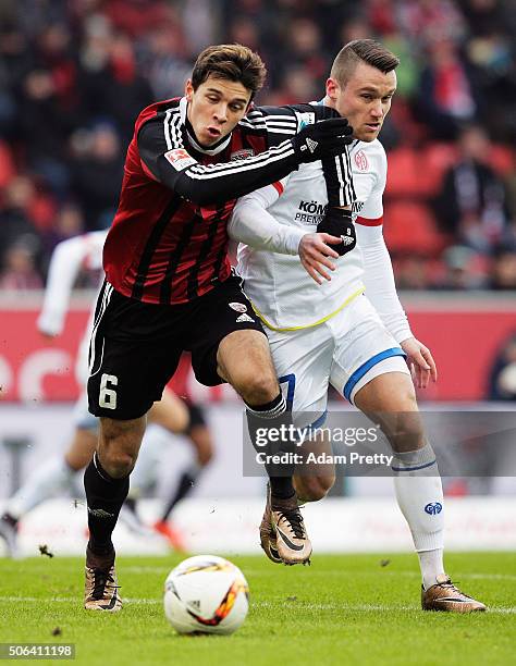 Alfredo Morales of Ingolstadt 04 is challenged by Christian Clemens of FSV Mainz 05 during the Bundesliga match between FC Ingolstadt and FSV Mainz...