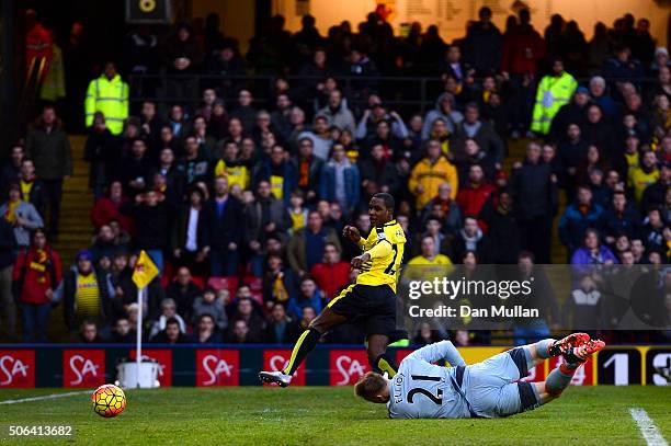 Odion Ighalo of Watford scores his team's first goal past Robert Elliot of Newcastle United during the Barclays Premier League match between Watford...