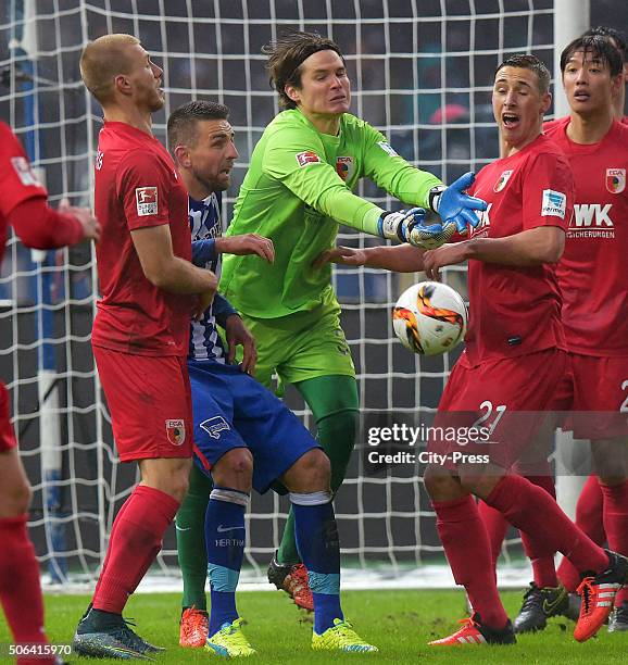 Ragnar Klavan of FC Augsburg, Vedad Ibisevic of Hertha BSC, Marwin Hitz and Dominik Kohr of FC Augsburg during the game between Hertha BSC and FC...