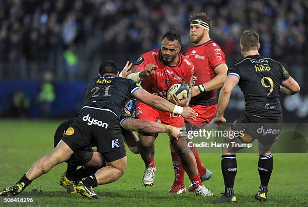 Romain Taofifenua of Toulon is tackled by Alafoti Faosiliva of Bath during the European Rugby Champions Cup match between Bath Rugby and RC Toulon at...