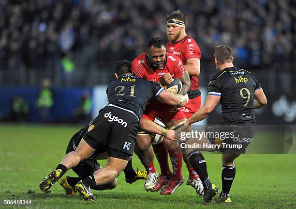 Romain Taofifenua of Toulon is tackled by Alafoti Faosiliva of Bath during the European Rugby Champions Cup match between Bath Rugby and RC Toulon at...