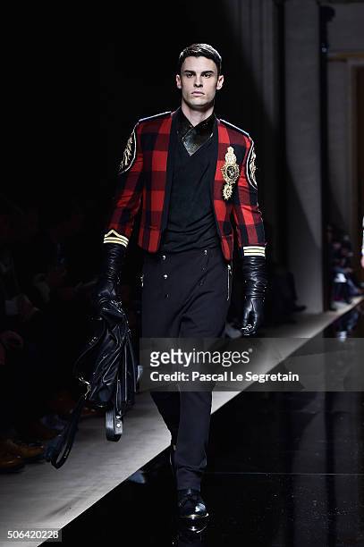 Baptiste Giabiconi walks the runway during the Balmain Menswear Fall/Winter 2016-2017 show as part of Paris Fashion Week on January 23, 2016 in...