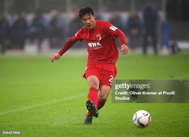 Defender Jeong-Ho Hong of FC Augsburg passing the ball at Olympiastadion on January 23, 2016 in Berlin, Germany.