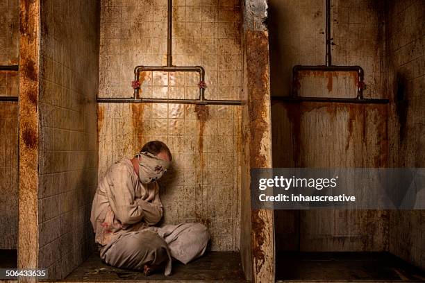 mental patient in the shower - restraining device stock pictures, royalty-free photos & images