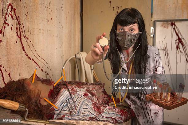 scary nurse - evil doctor stock pictures, royalty-free photos & images