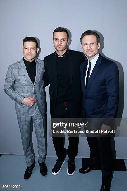 Actor Rami Malek, Fashion designer Kris Van Assche and Actor Christian Slater pose Backstage after the Dior Homme Menswear Fall/Winter 2016-2017 show...