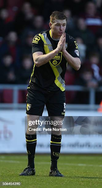 Adam Dugdale of Morecambe holds his hands in prayer during the Sky Bet League Two match between Northampton Town and Morecambe at Sixfields Stadium...