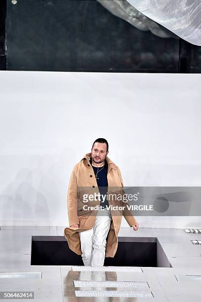 Fashion designer Kim Jones walks the runway during the Louis Vuitton Menswear Fall/Winter 2016-2017 show as part of Paris Fashion Week on January 21,...