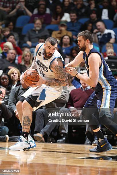 Nikola Pekovic of the Minnesota Timberwolves makes his move against Marc Gasol of the Memphis Grizzlies on January 23, 2016 at Target Center in...