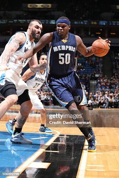 Zach Randolph of the Memphis Grizzlies drives against Nikola Pekovic of the Minnesota Timberwolves on January 23, 2016 at Target Center in...