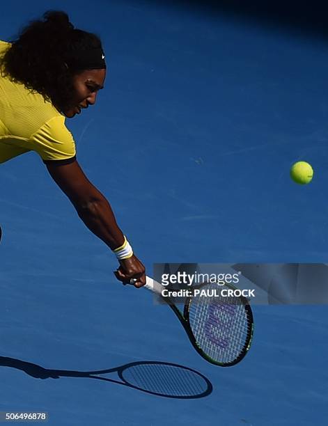 Serena Williams of the US serves against Russia's Margarita Gasparyan during their women's singles game on day seven of the 2015 Australian Open...