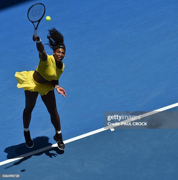 Serena Williams of the US serves against Russia's Margarita Gasparyan during their women's singles game on day seven of the 2015 Australian Open...