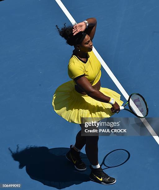 Serena Williams of the US celebrates following her win over Russia's Margarita Gasparyan during their women's singles game on day seven of the 2015...