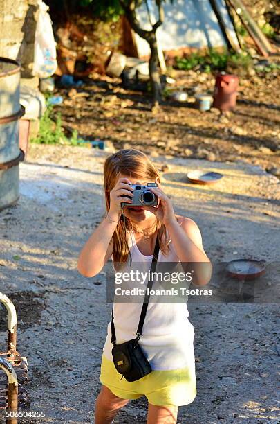 girl with camera - kataraktis village stock pictures, royalty-free photos & images