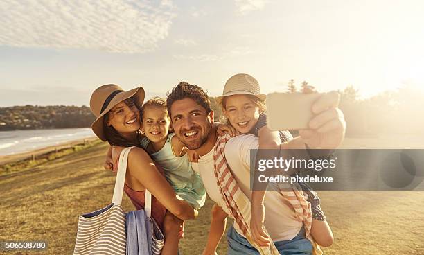 the best memories are made on the beach - family selfie stock pictures, royalty-free photos & images