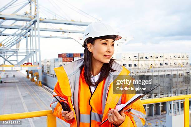 she's an expert at export - dock worker stock pictures, royalty-free photos & images